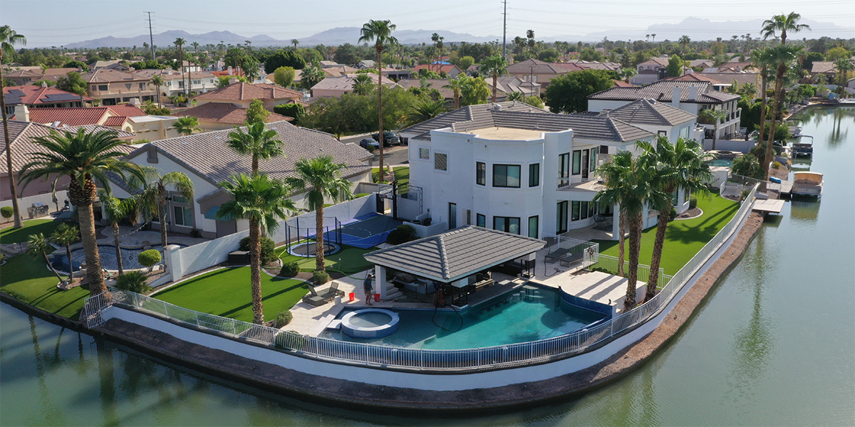 Aerial view of Greater Phoenix metro, with clean swimming pool in focus